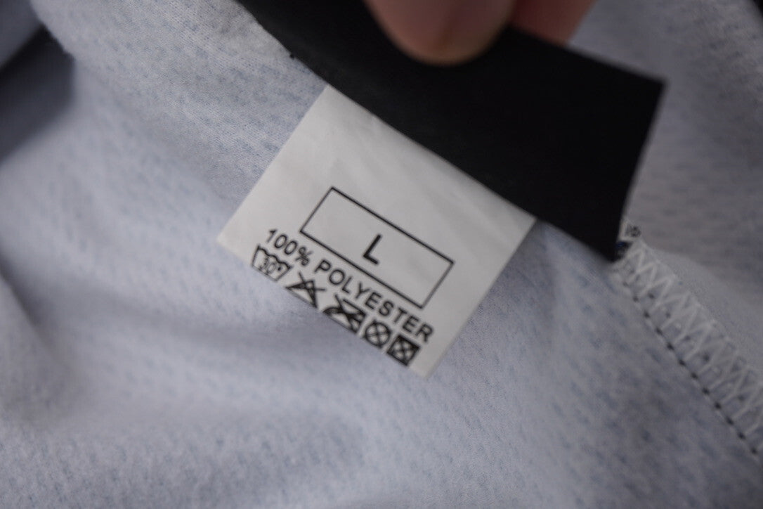 7006882